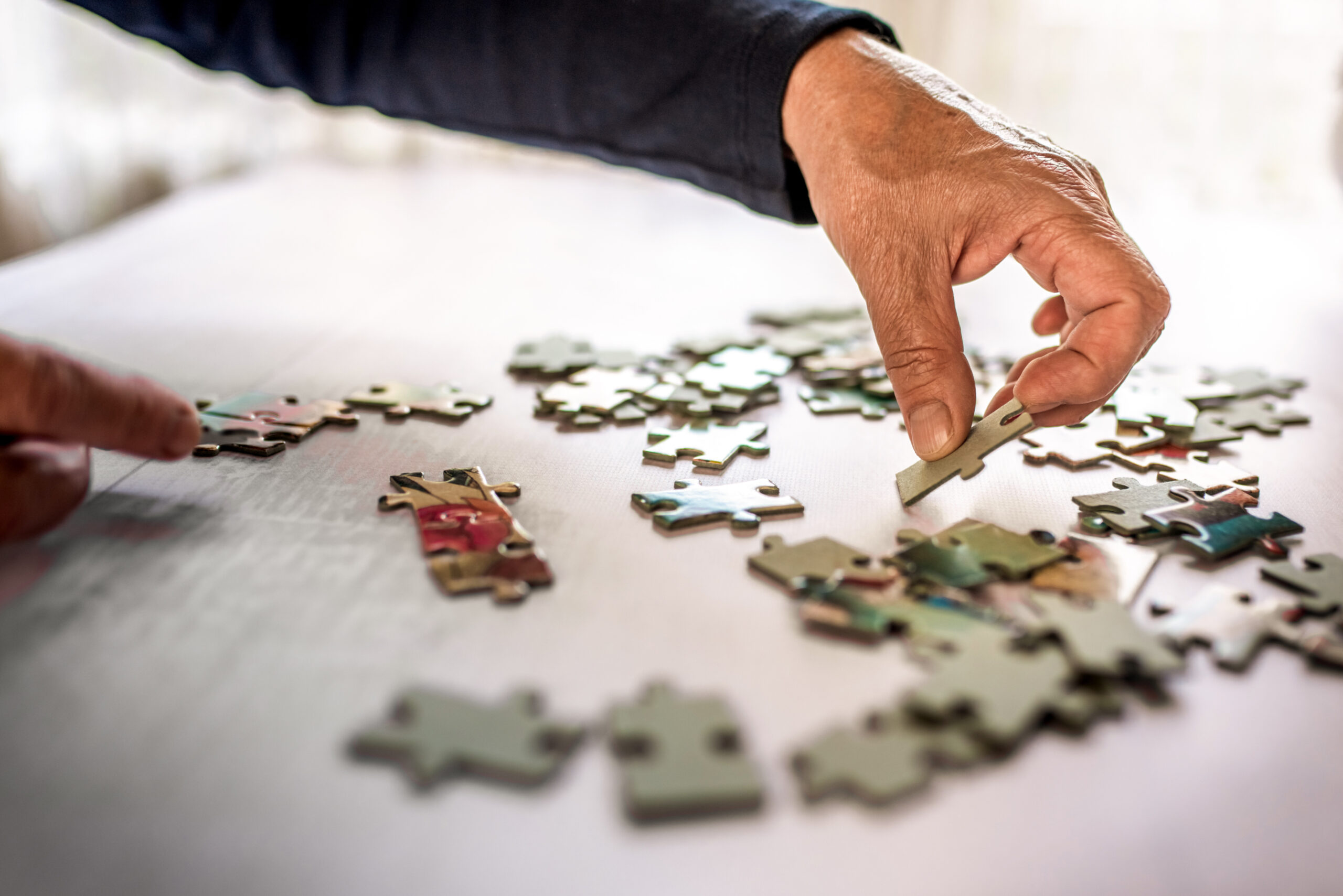 Photo of Someone doing a puzzle